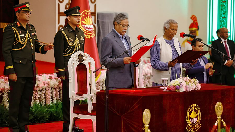 <div class="paragraphs"><p>Bangladeshi President Mohammed Shahabuddin administers the oath-taking ceremony of Nobel laureate Muhammad Yunus as the  head of the interim government in Bangladesh.</p></div>